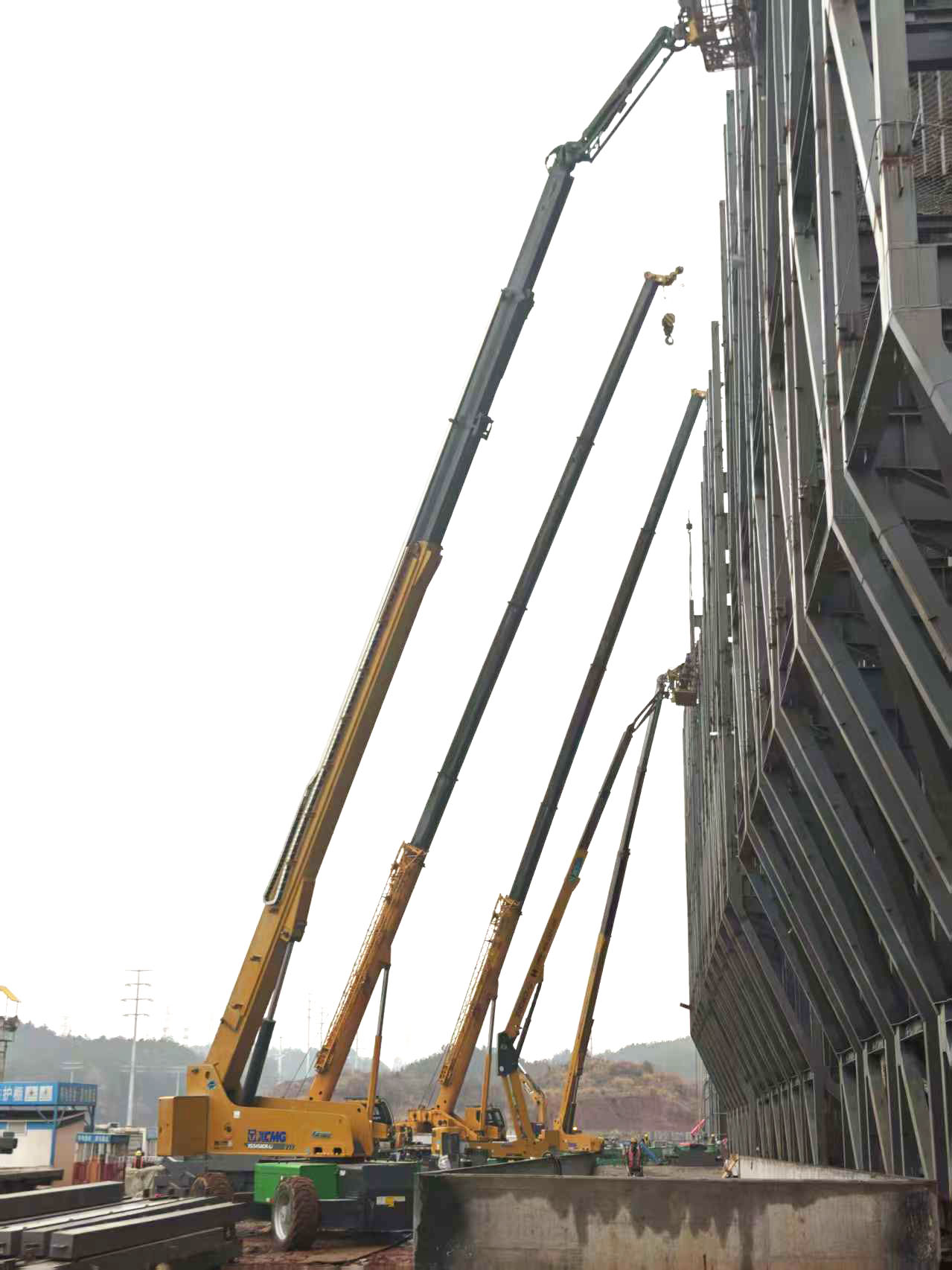 高空協(xié)同顯實(shí)力｜徐工裝備助陣銀聯(lián)黃山園區(qū)，外立面施工提質(zhì)增效